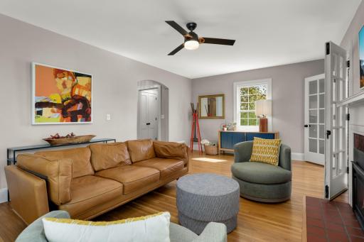 Large main floor living room with original hardwood floors