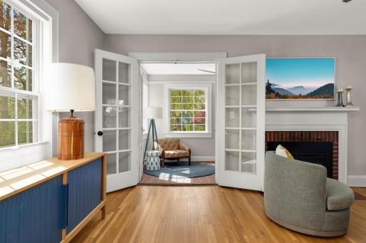 Set of double french doors leading to the 4 season Sun Room/ Office