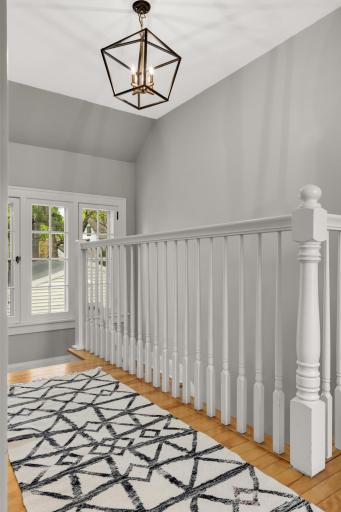Open and airy 2nd floor landing. With swing out
