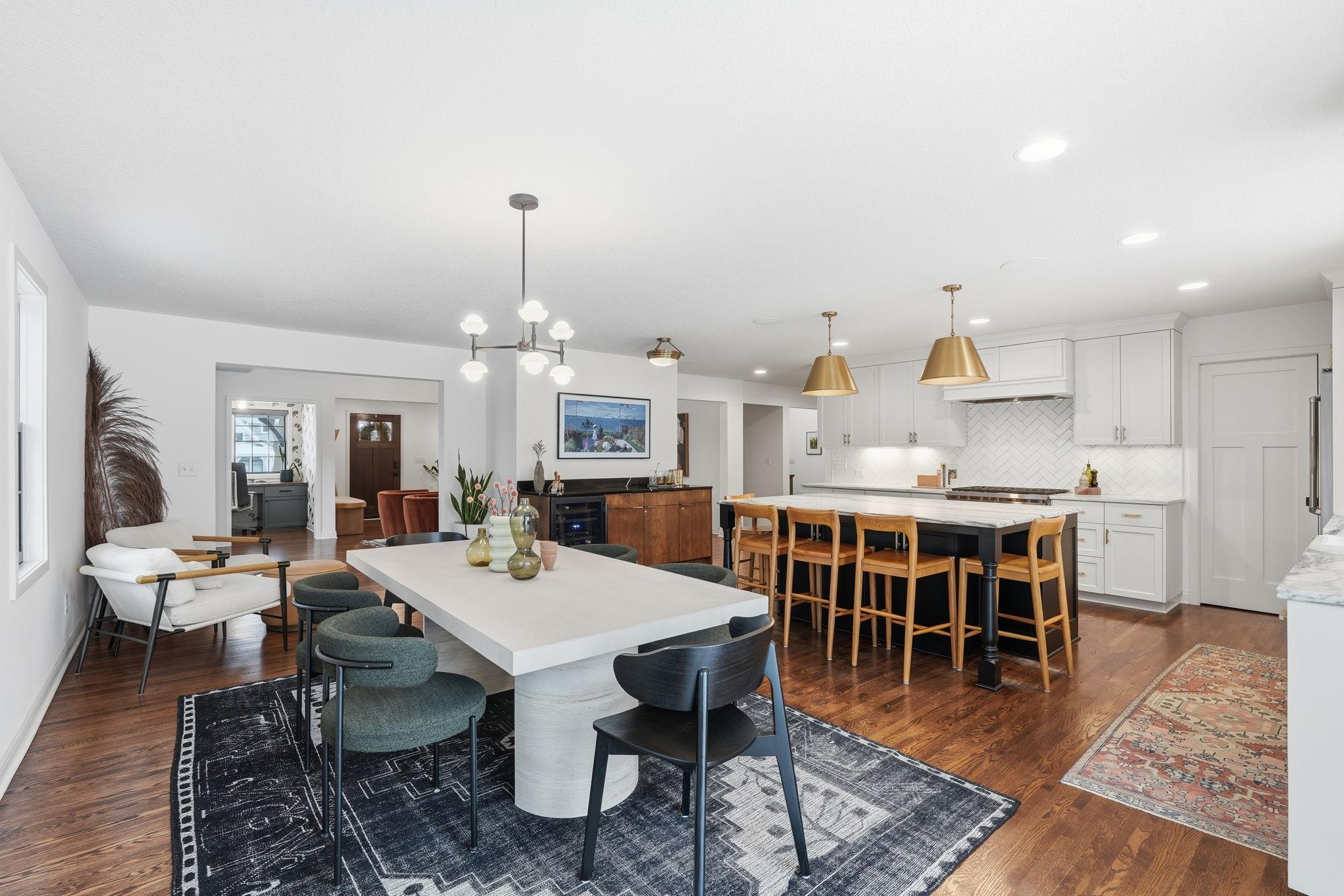 The heart of the home features a chef-inspired kitchen where high-end function meets designer aesthetics.