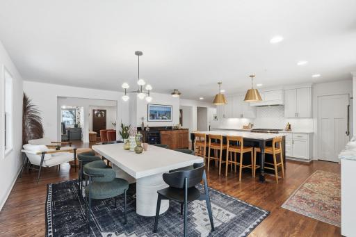 The heart of the home features a chef-inspired kitchen where high-end function meets designer aesthetics.