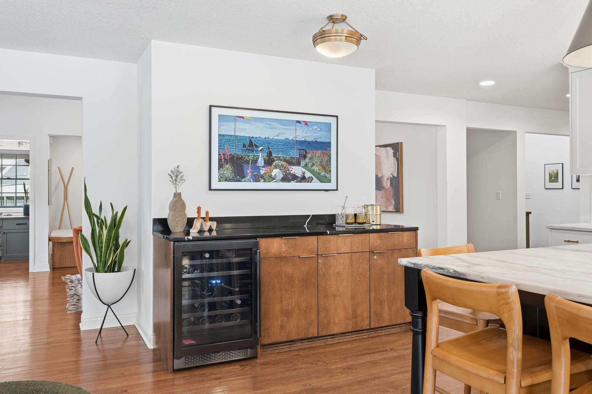 The kitchen includes a dedicated wine fridge and premium finishes, it’s the perfect designated spot for entertaining.