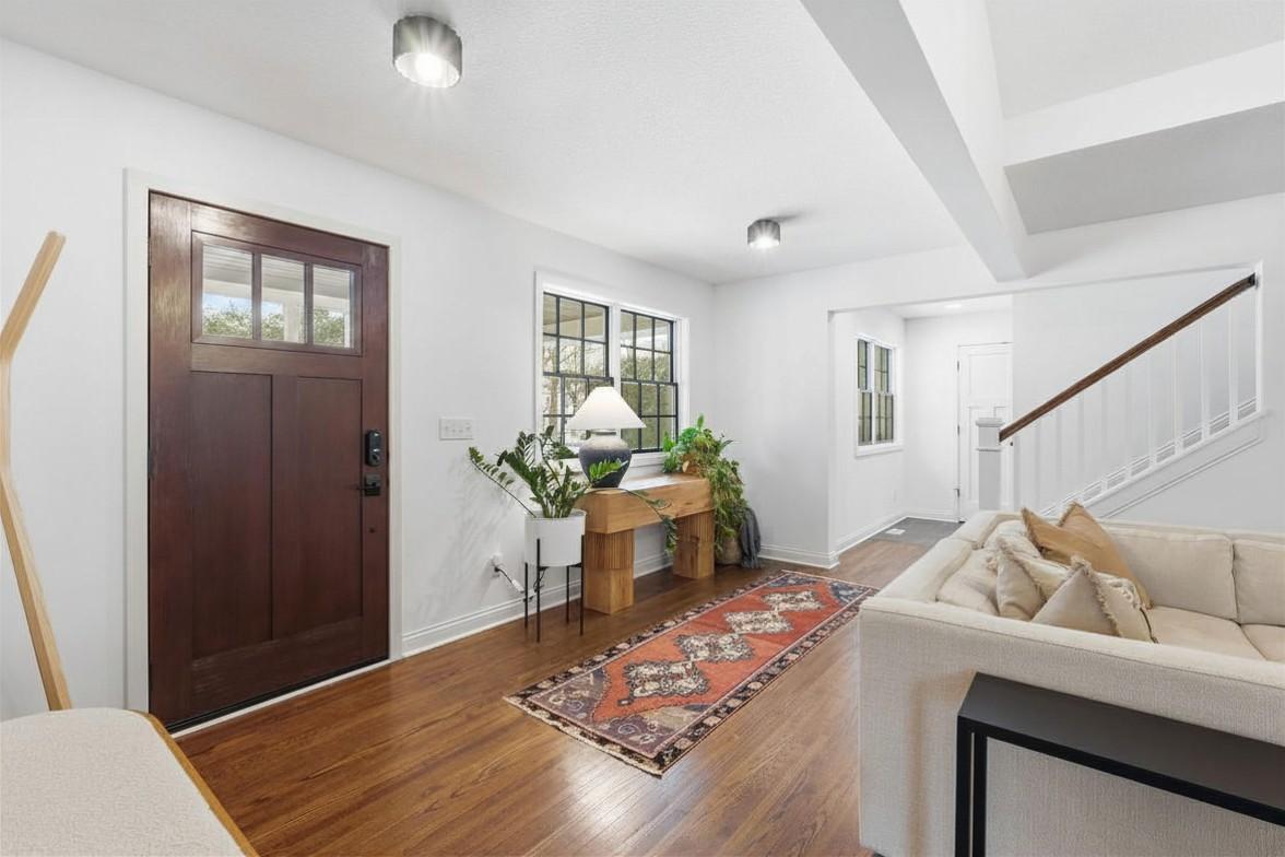 Hallway leading to the staircase.