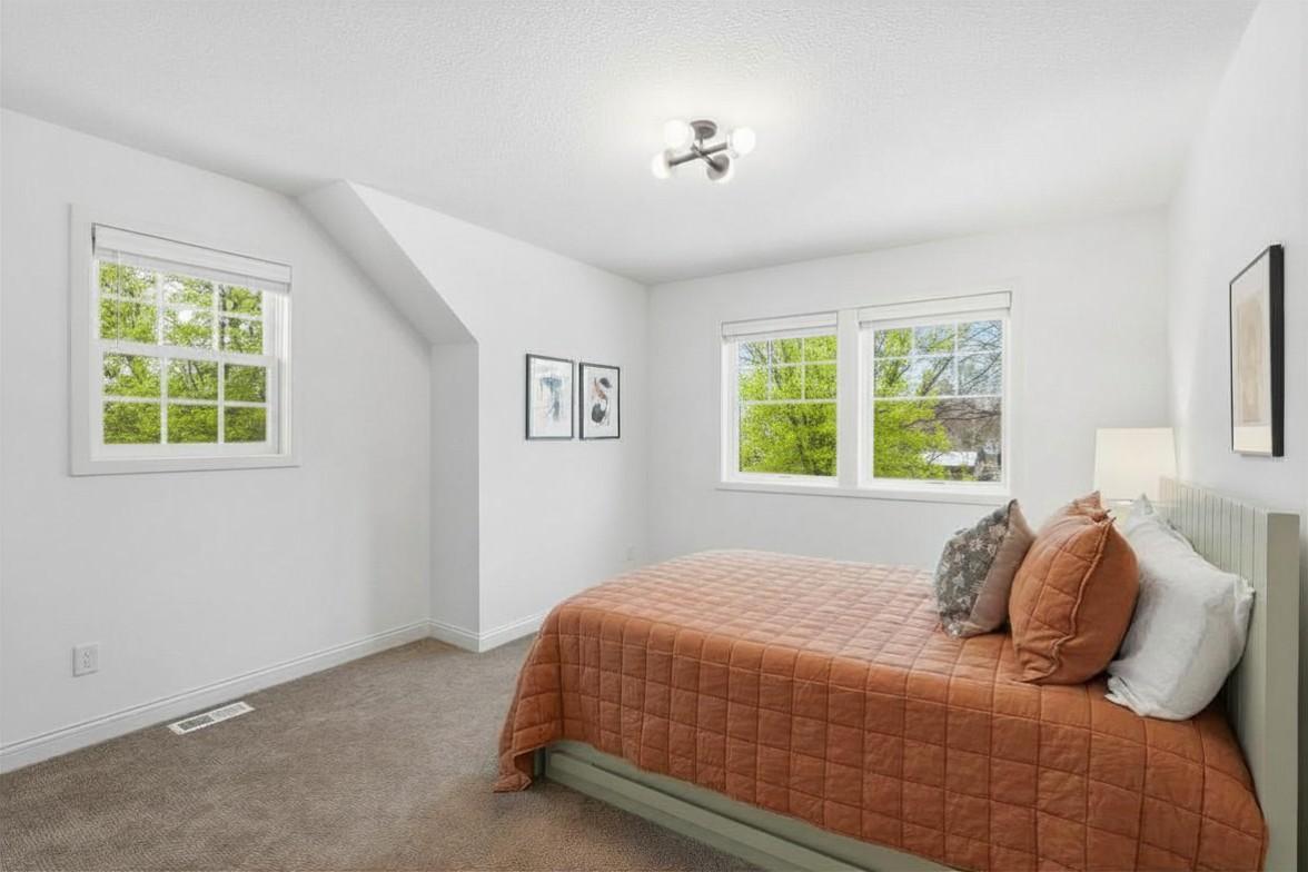 Another view of the upper level bedroom.