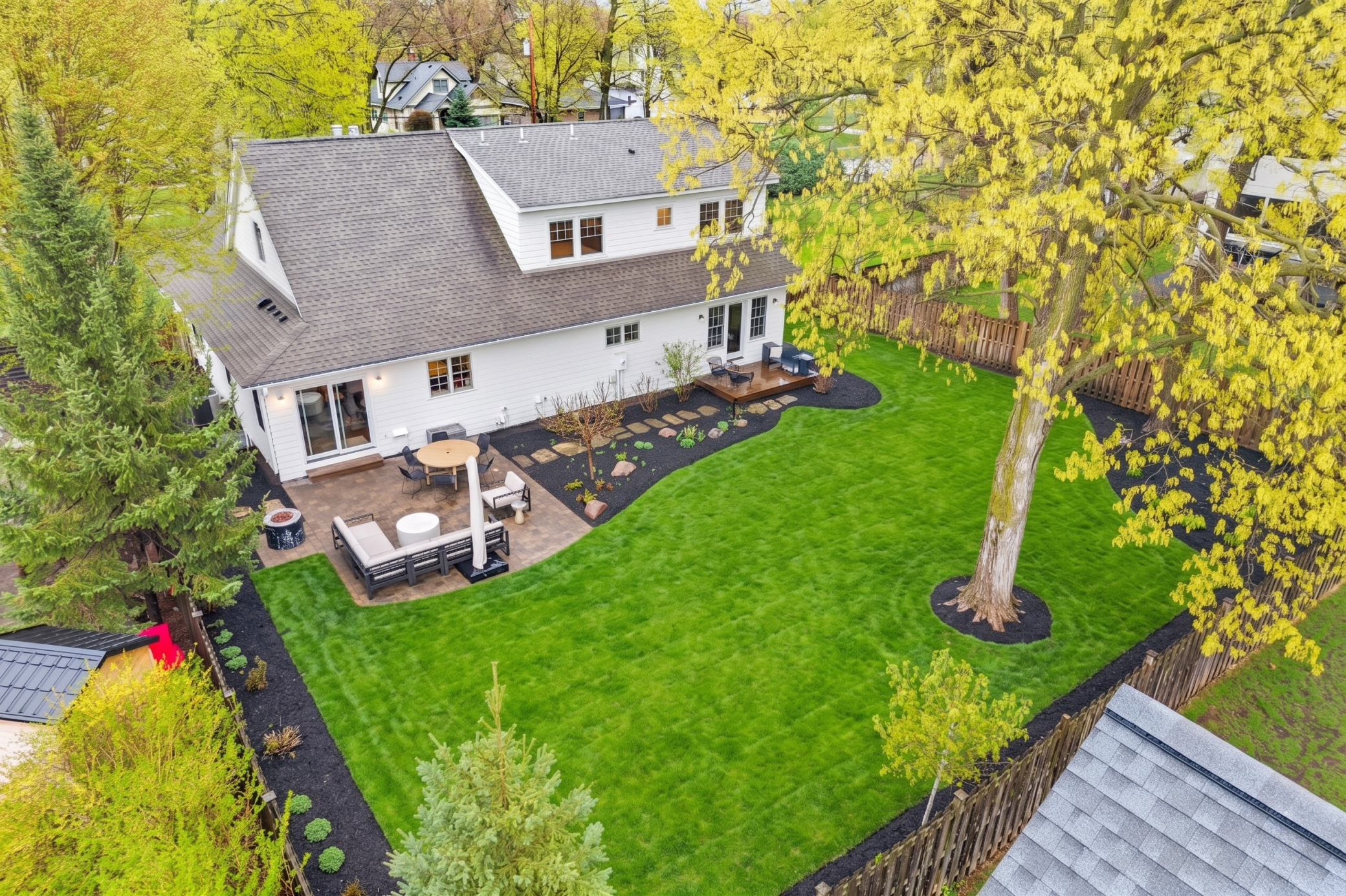 The backyard is flat and fully fenced.