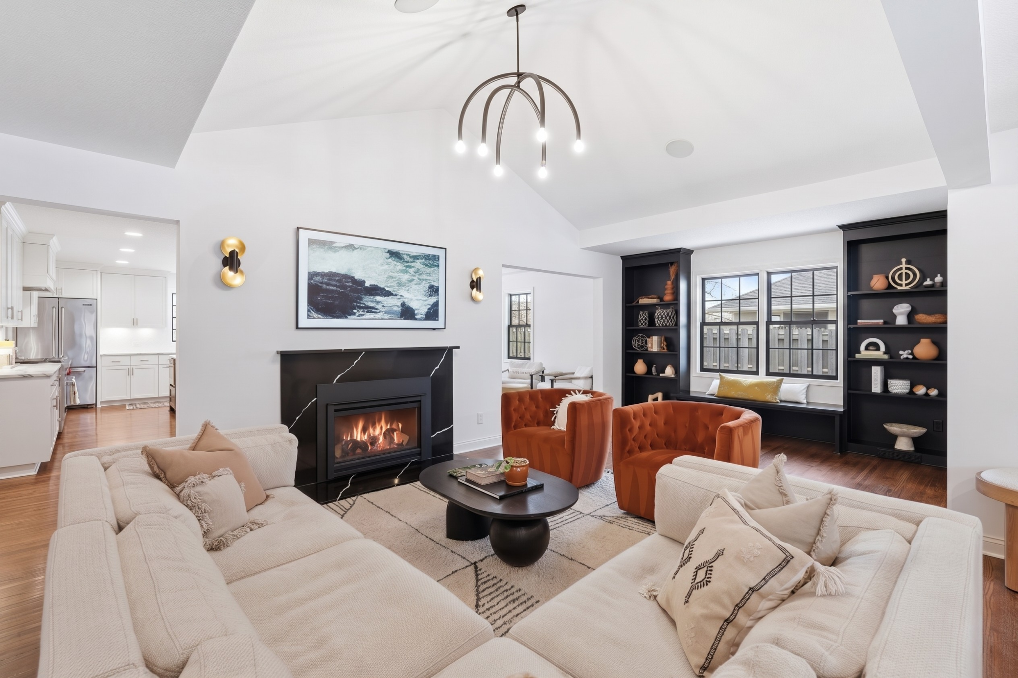 When you step inside you'll be greeted with vaulted ceilings and a beautiful gas fireplace.