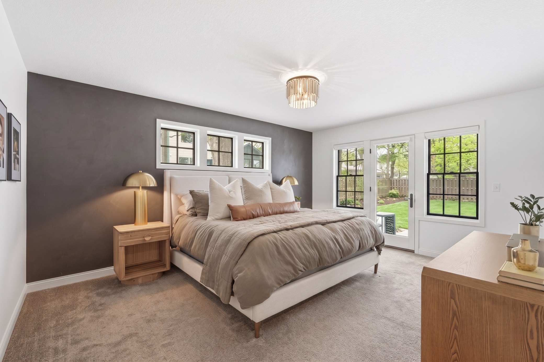 Every square inch of this primary retreat has been thoughtfully curated to balance bold design with serene comfort.