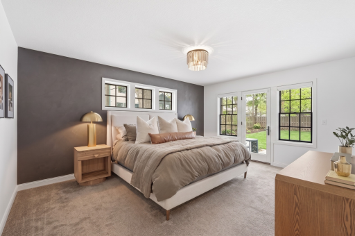 Every square inch of this primary retreat has been thoughtfully curated to balance bold design with serene comfort.