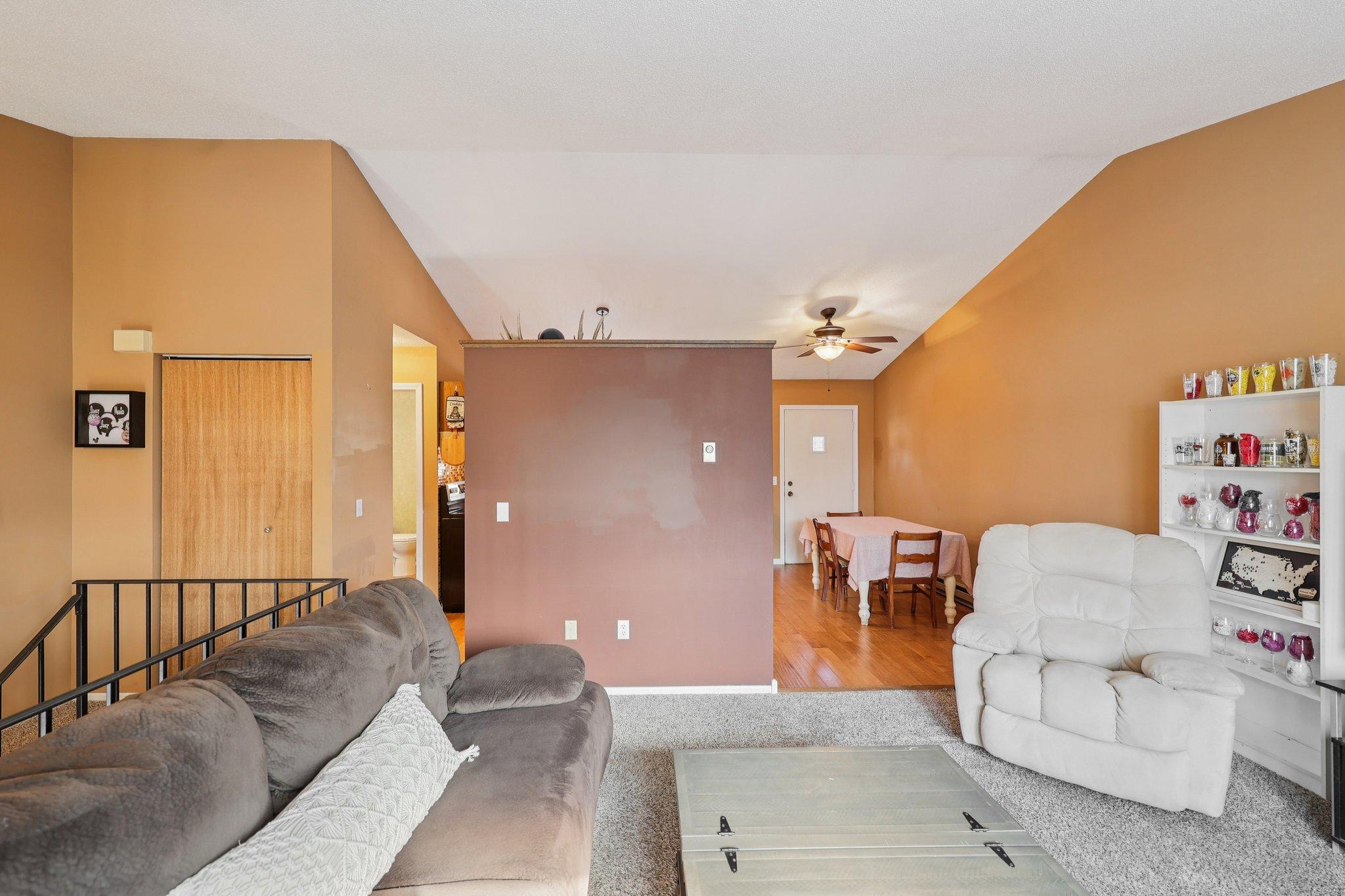 Coat closet at the top of the stairs