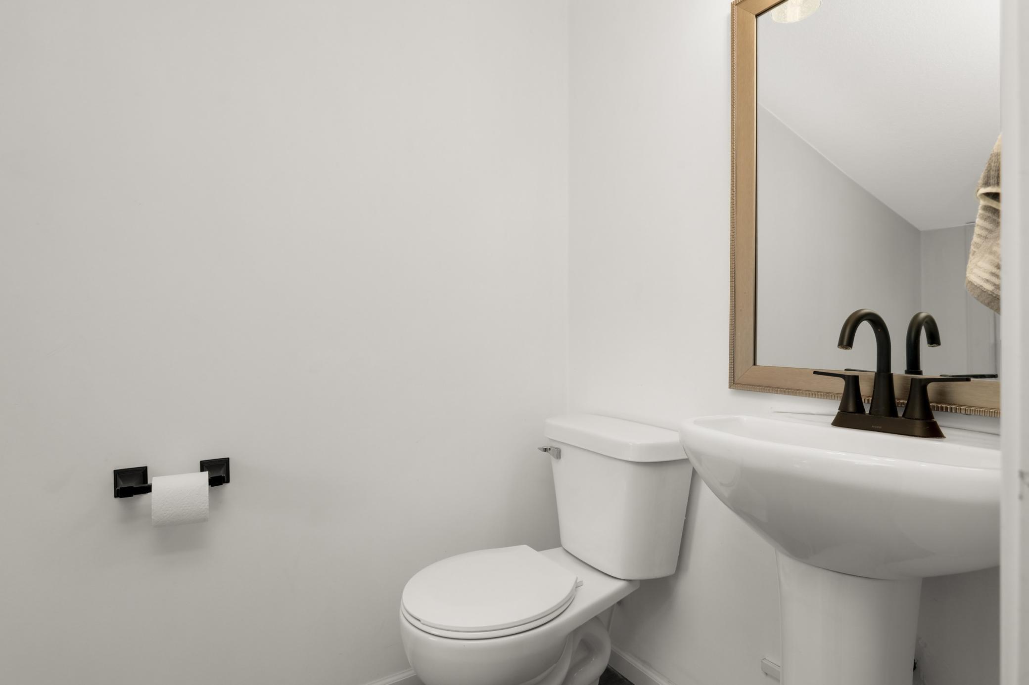 Upper level, ensuite half bathroom.