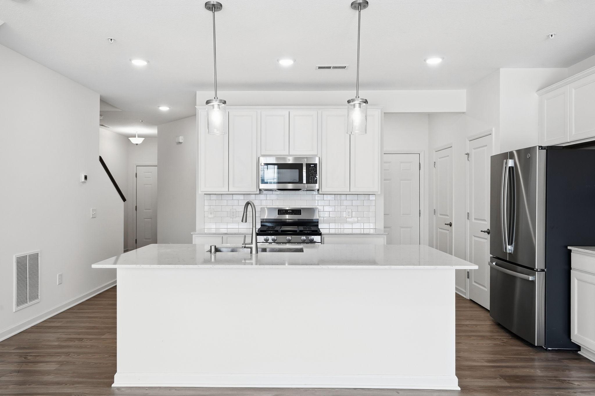 View to the right is the pantry and the coat closet in the back entry