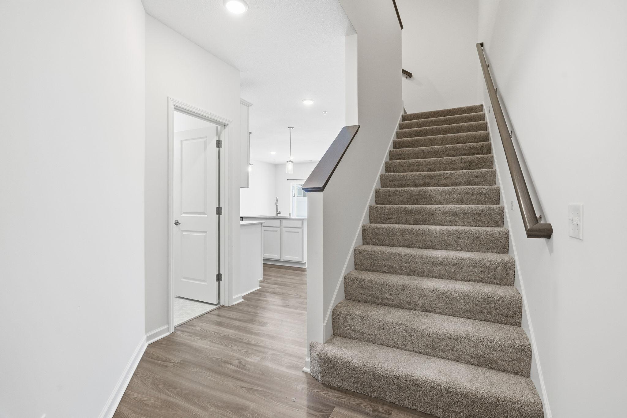 Half bath conveniently located on the left, just inside the front entry