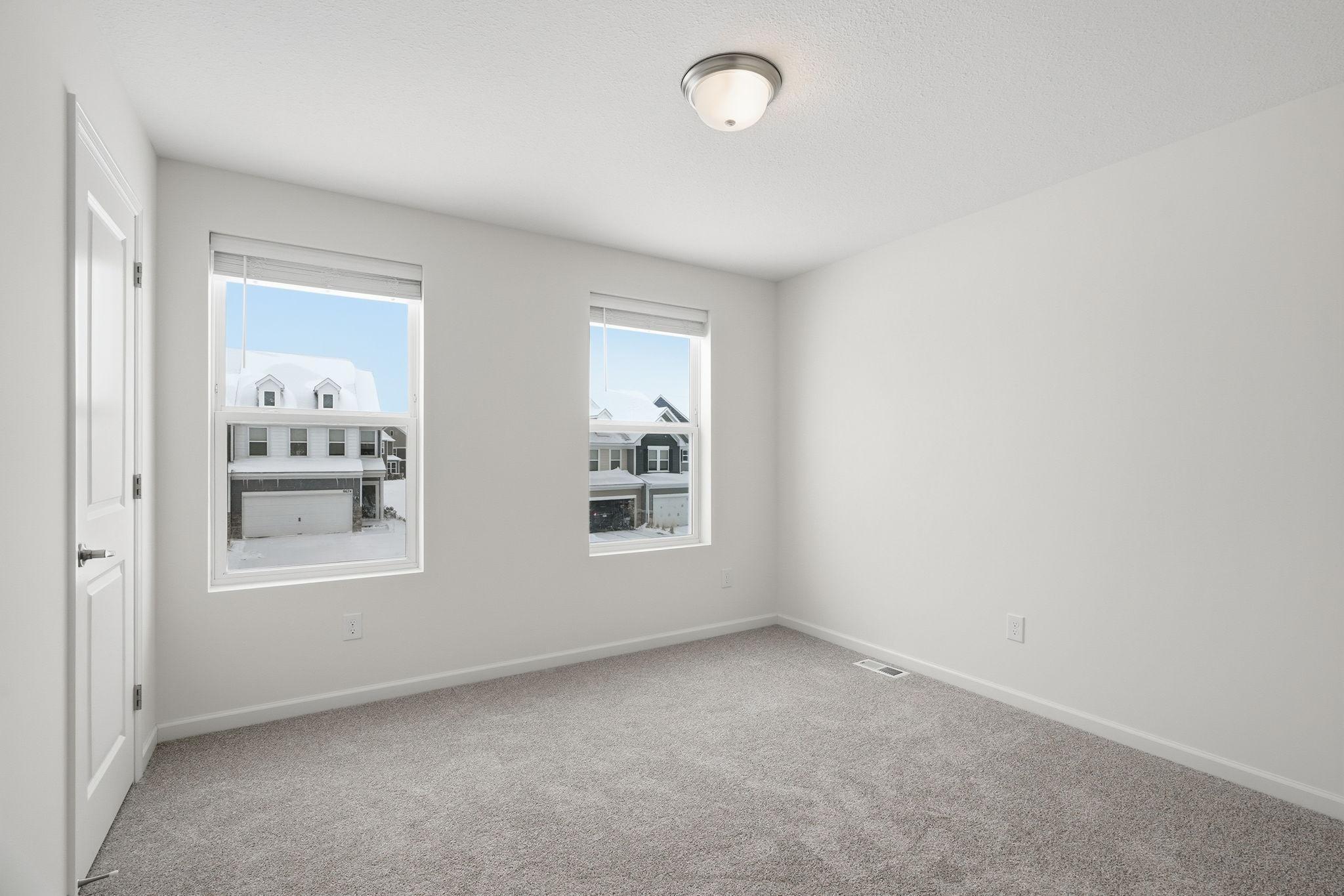 Bedroom 3 with 2 large windows