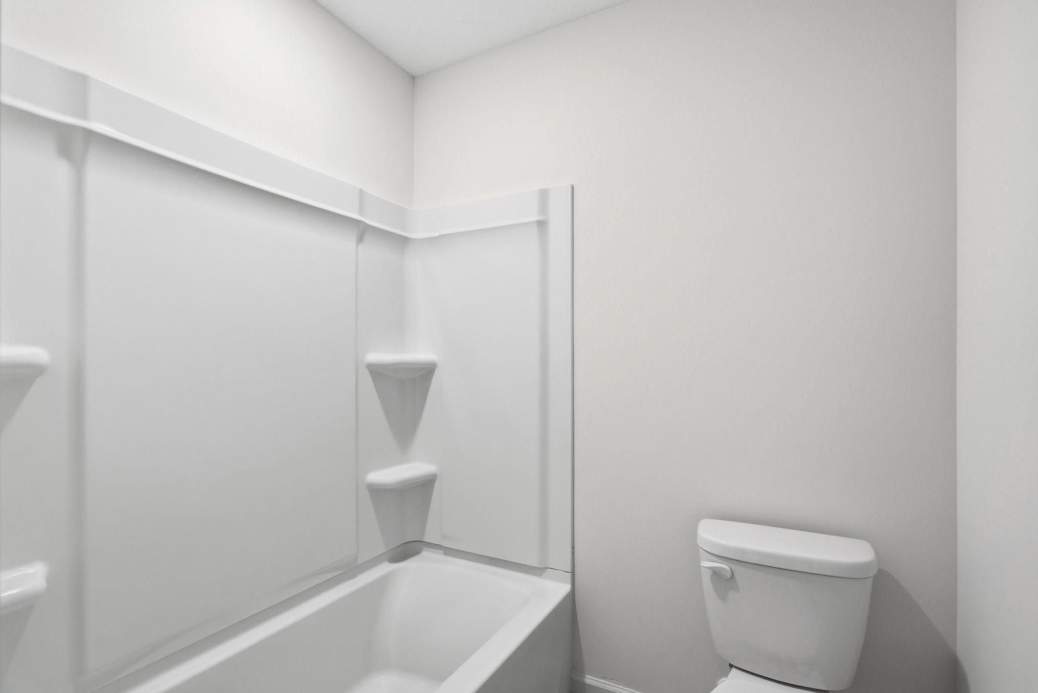 separate shower room with door