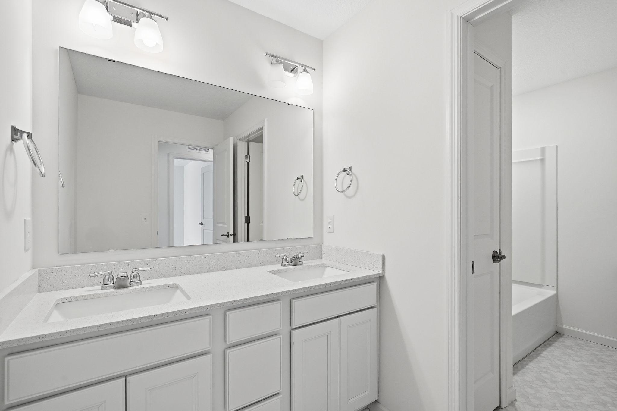 Full upper bath near bedrooms 2 and 3