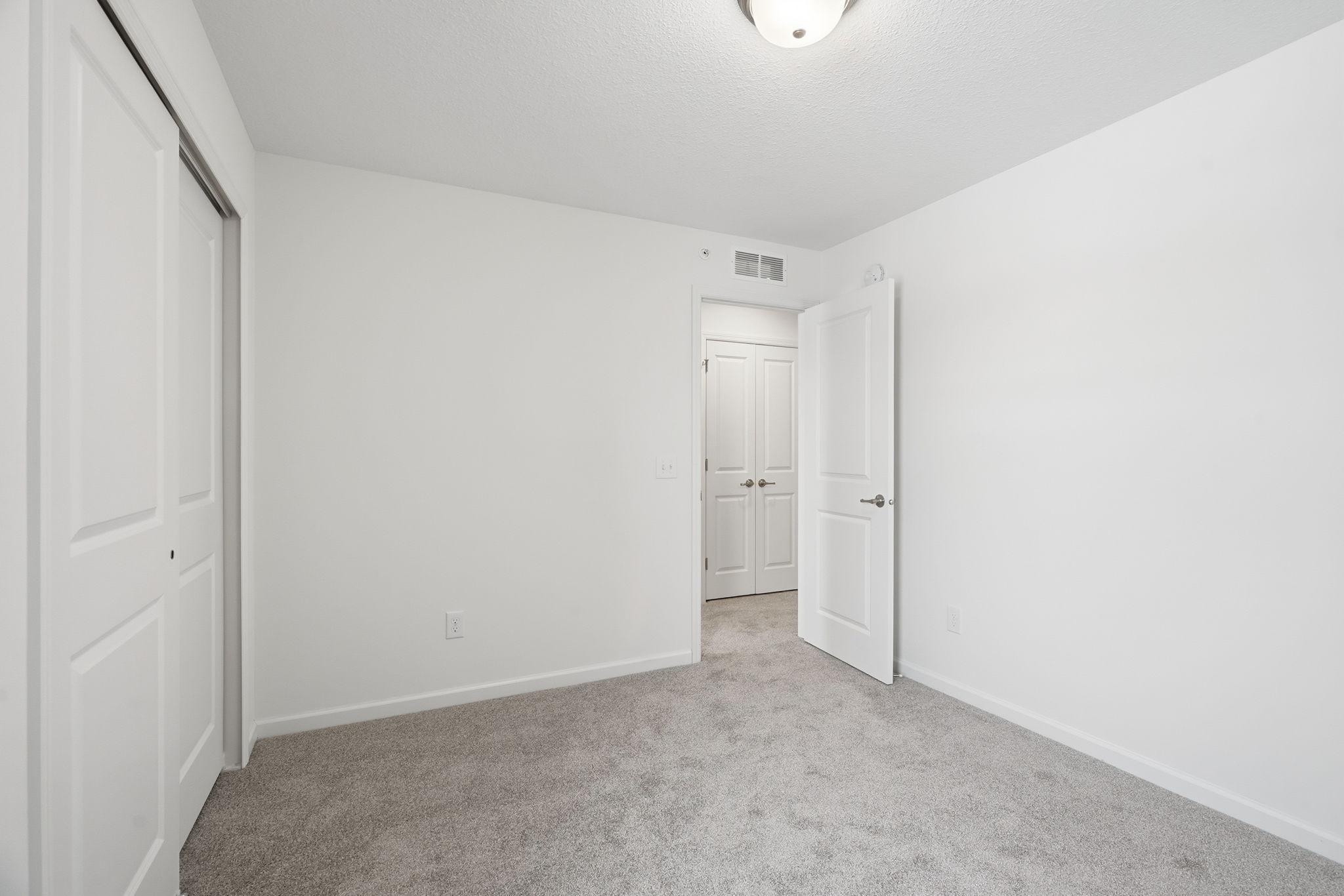 Bedroom 2 view of large hall closet