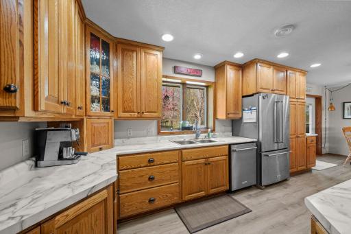The kitchen window overlooks gorgeous flowering crab trees!21650 Oakdale Dr, Corcoran, MN