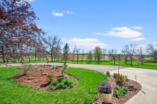 Perrenials surrounding the home mean yearly blooms and low maintenance hostas. 21650 Oakdale Dr, Corcoran, MN