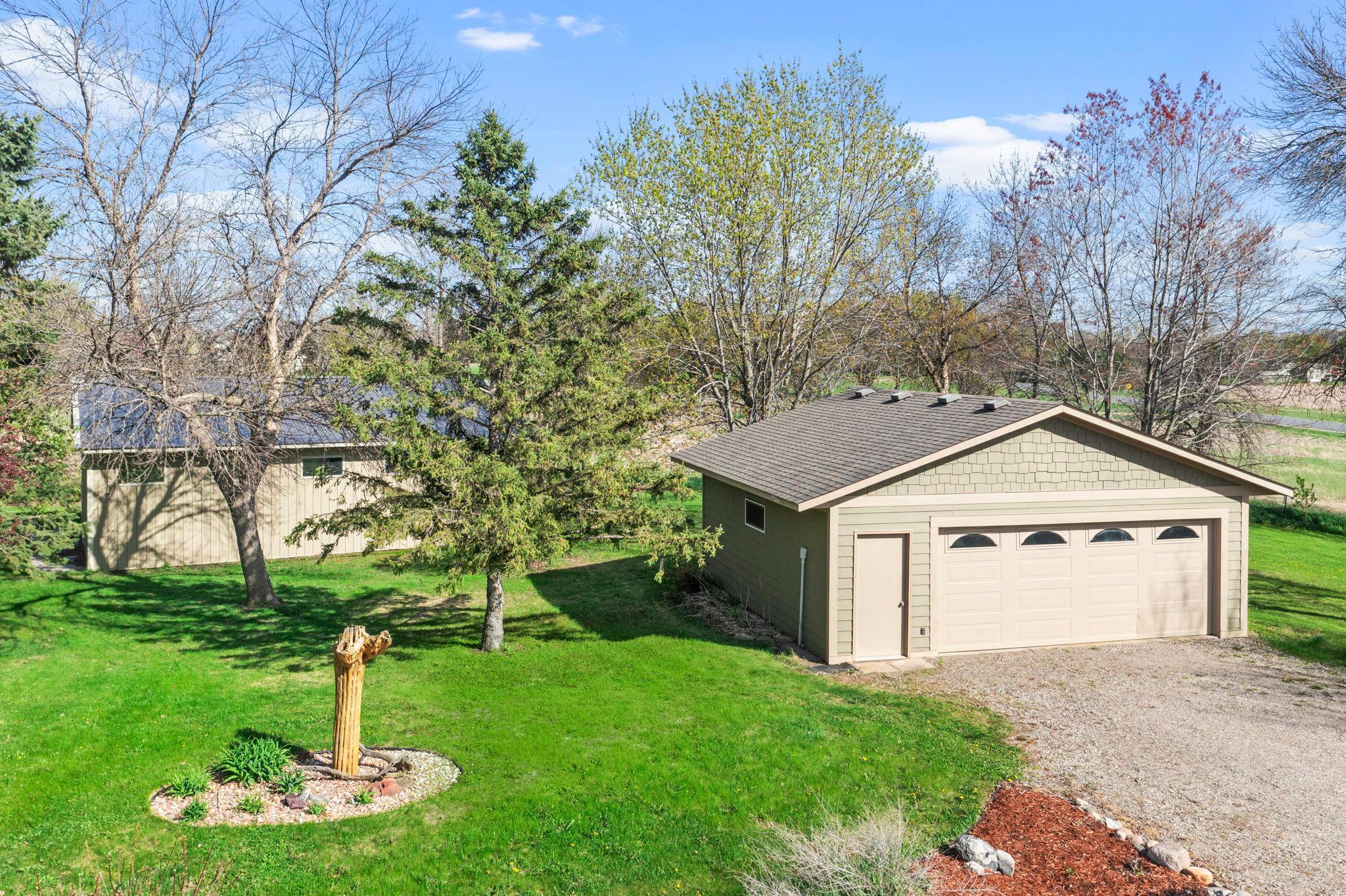 Detached garage is currently being utilized as a wood working shop.21650 Oakdale Dr, Corcoran, MN