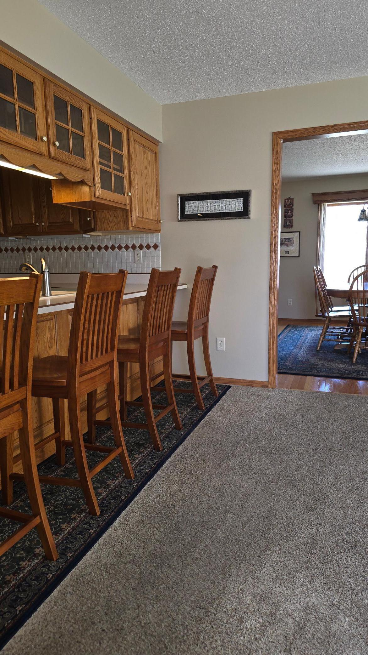 4 wood counter stools will remain.jpg