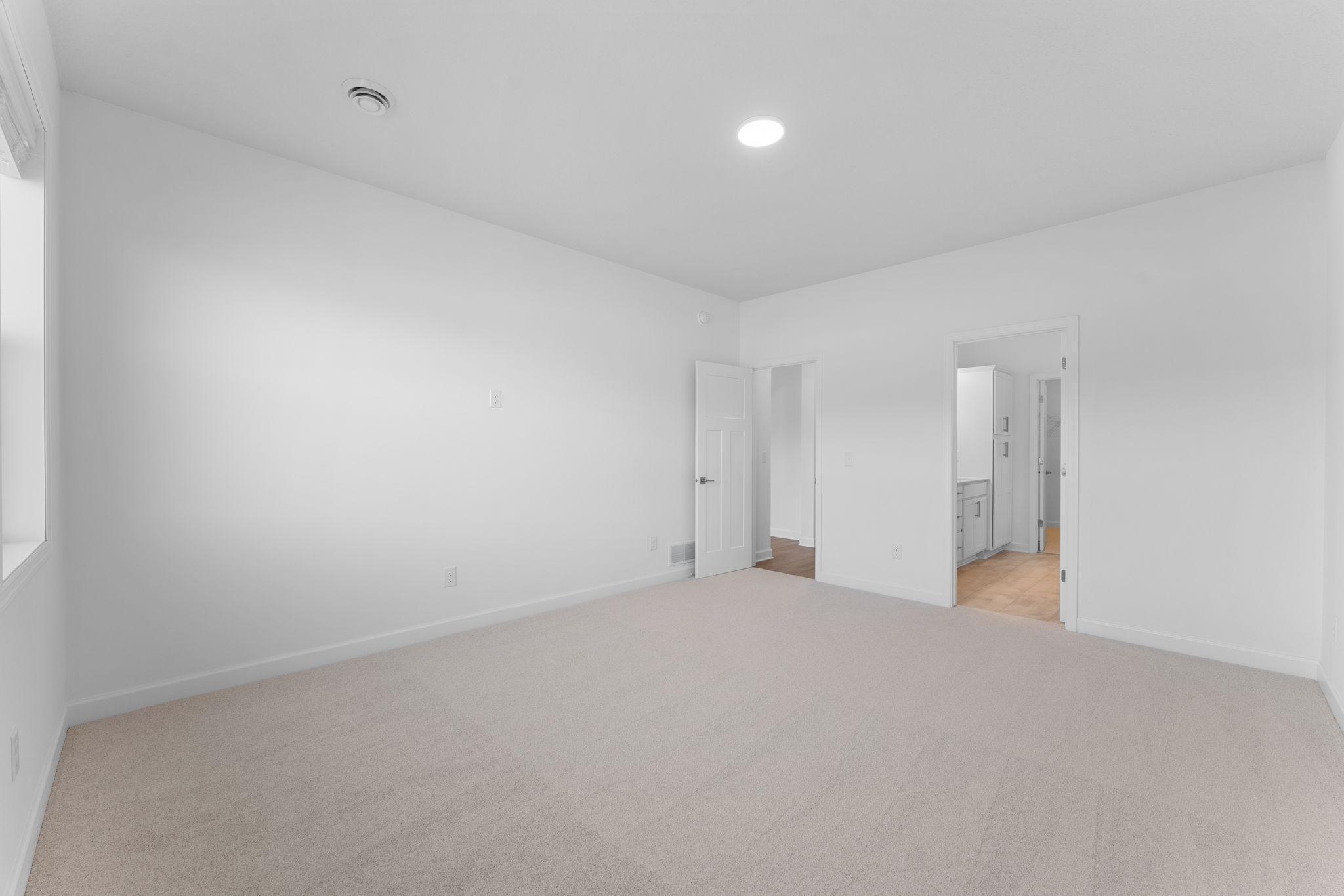 The bedroom is a comfortable retreat from the rest of the home