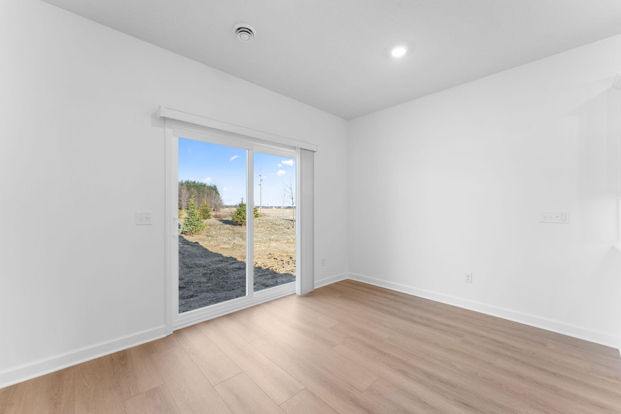 Access to the backyard is made easy with these sliding glass doors