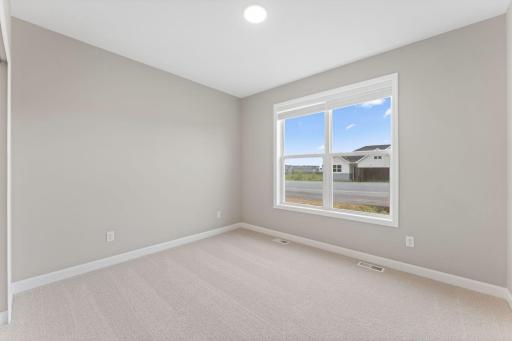 At the front of the home is a bedroom to accommodate family members or visiting guests.