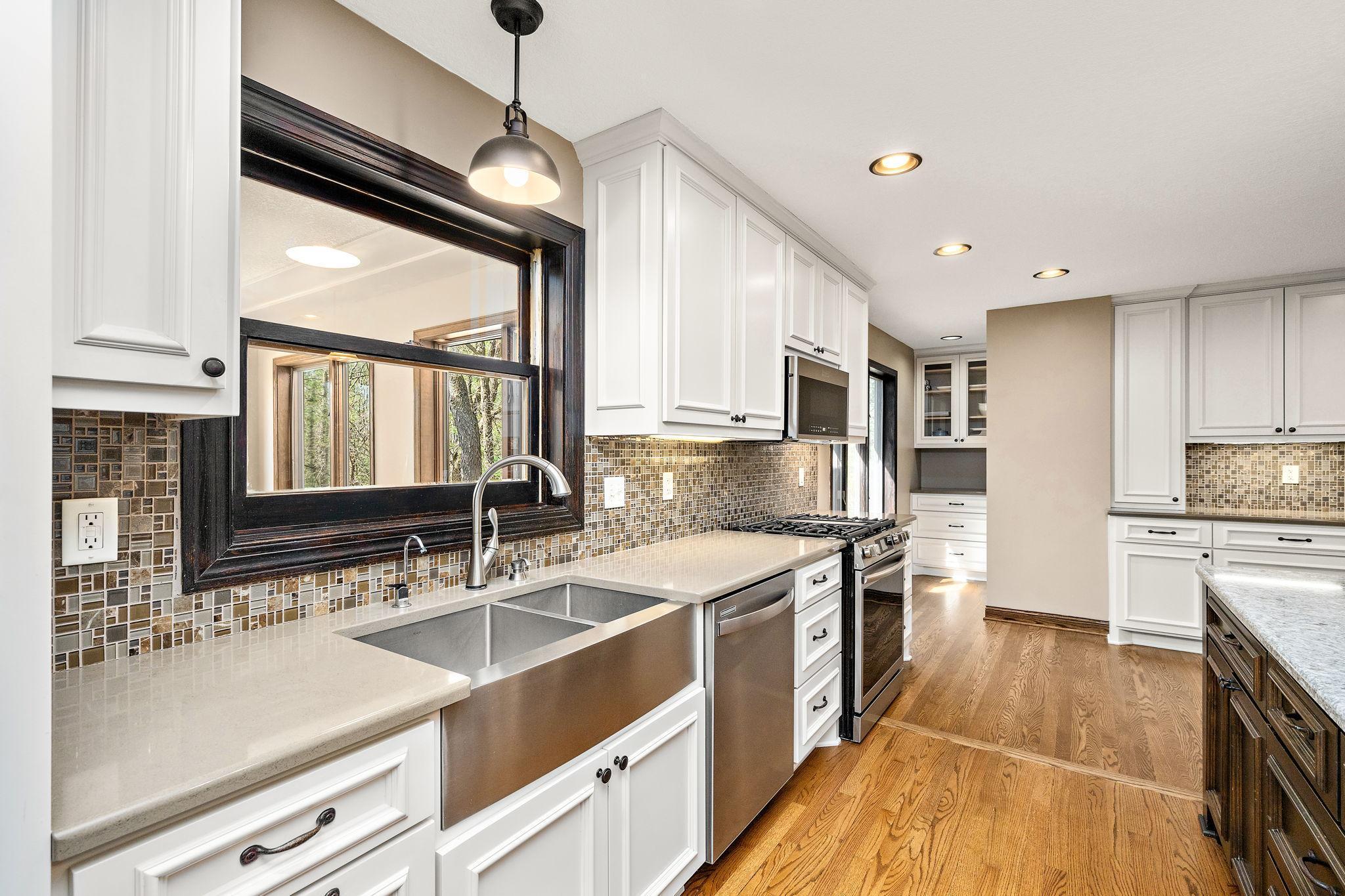 Kitchen window looking into sunroom