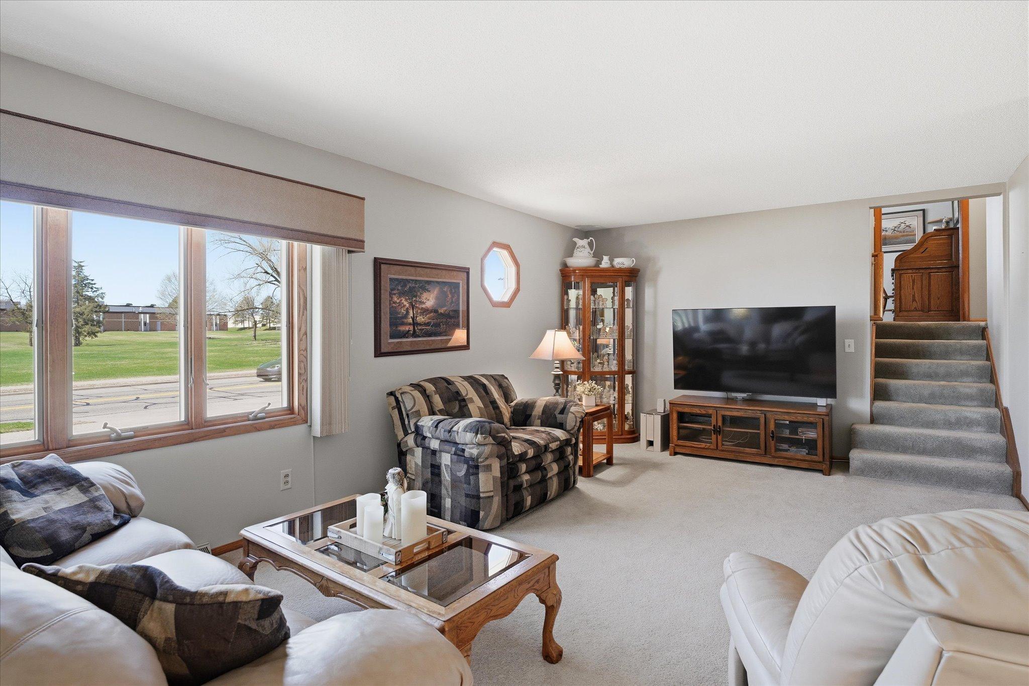 The steps lead up to 2 bedroom areas.