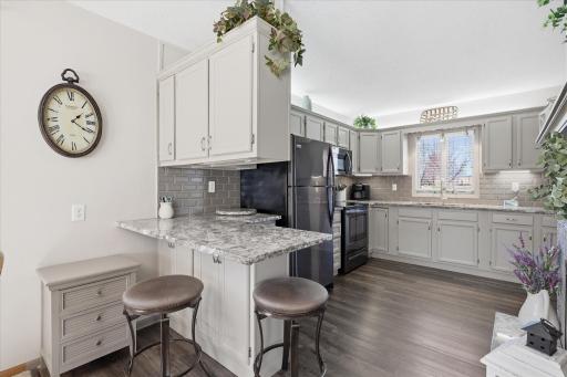 Notice all the cabinetry for storage needs plus wonderful counter space and a breakfast nook for snacks and light meals.