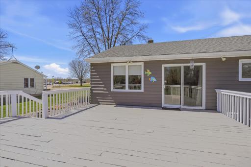 Massive deck off the rear of the home is perfect for gatherings, grilling and entertaining.