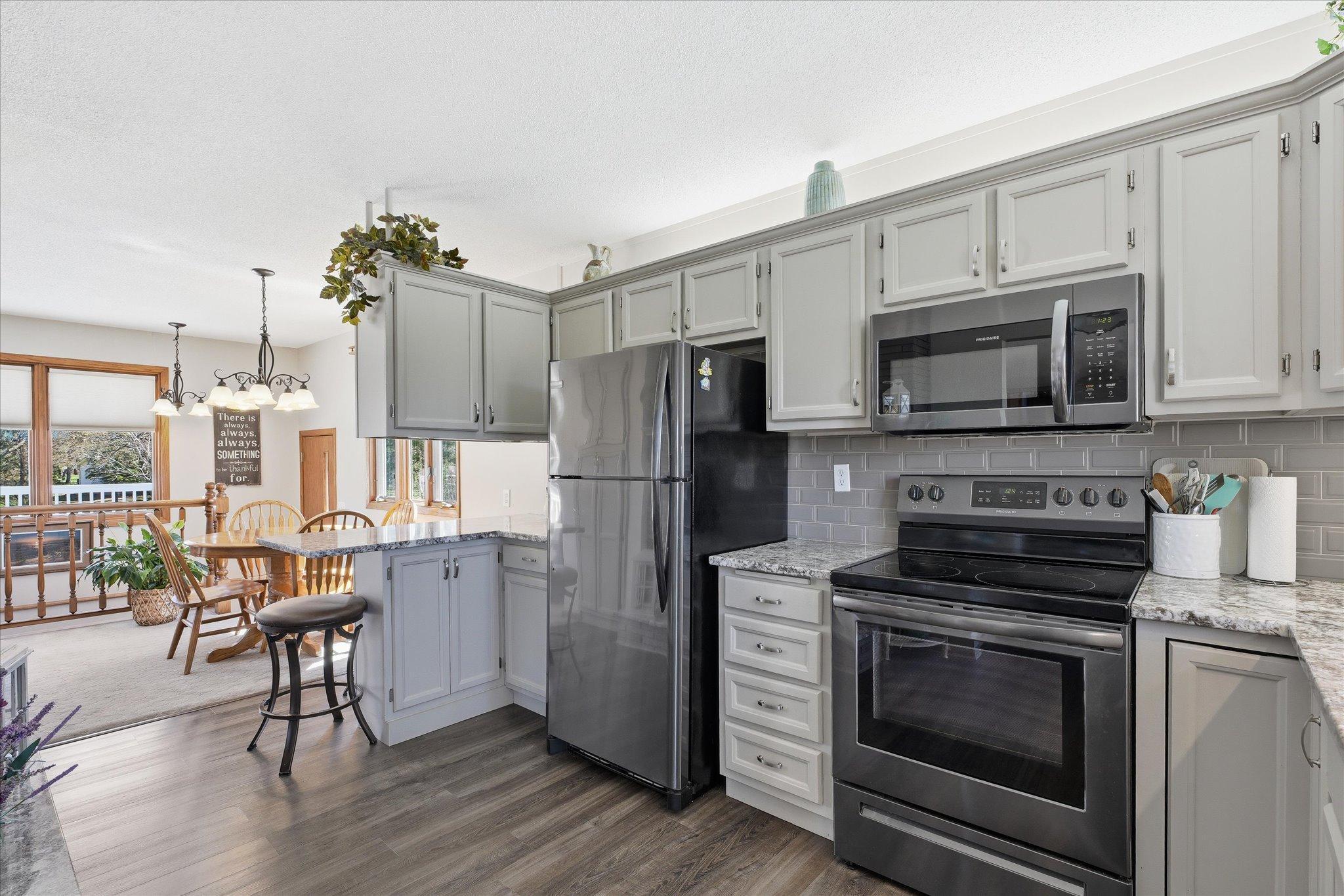 The kitchen opens to the dining area and family room. Morning coffee can be enjoyed at the breakfast nook.