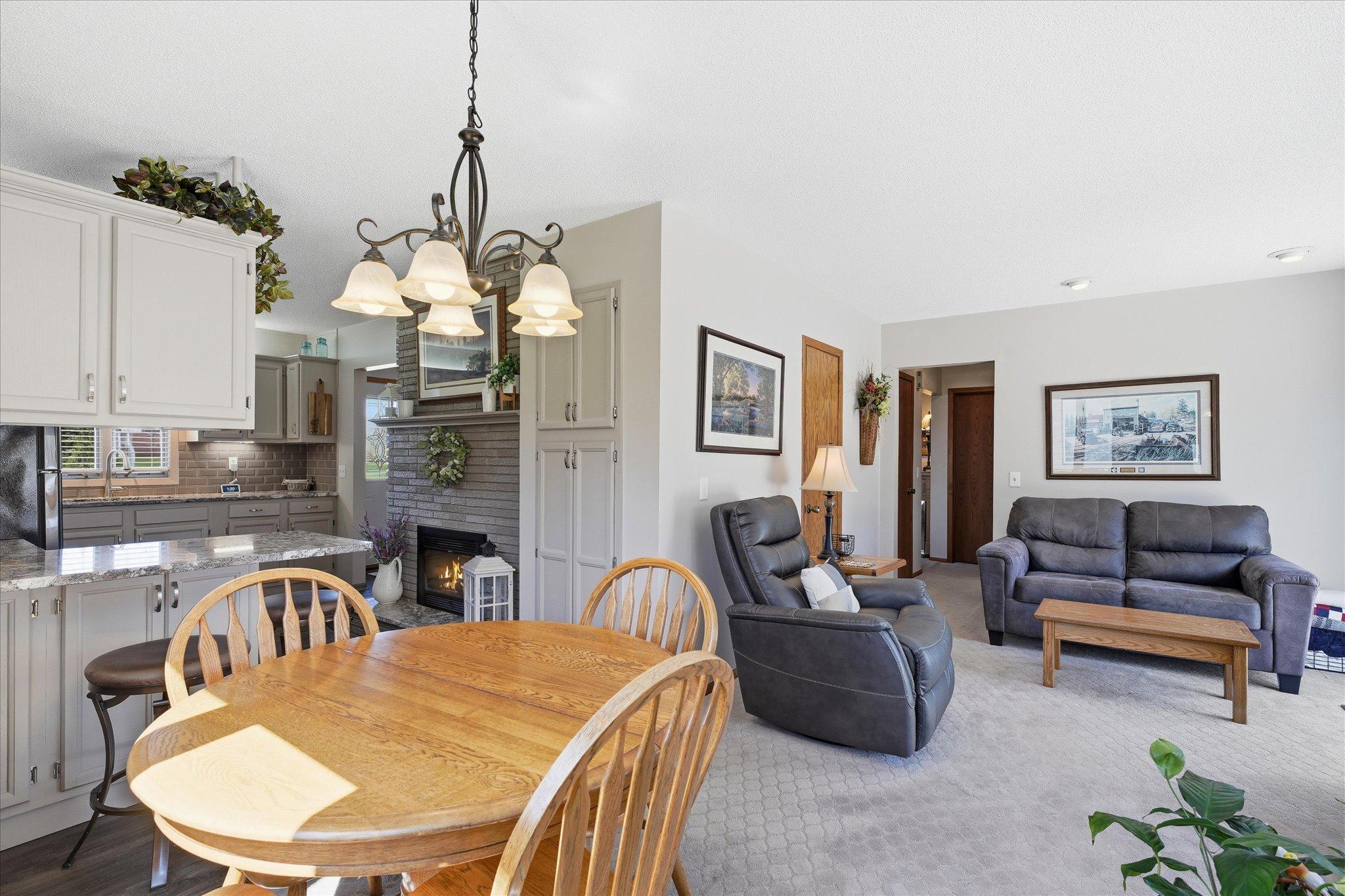 View of the dining room, kitchen and family room area.