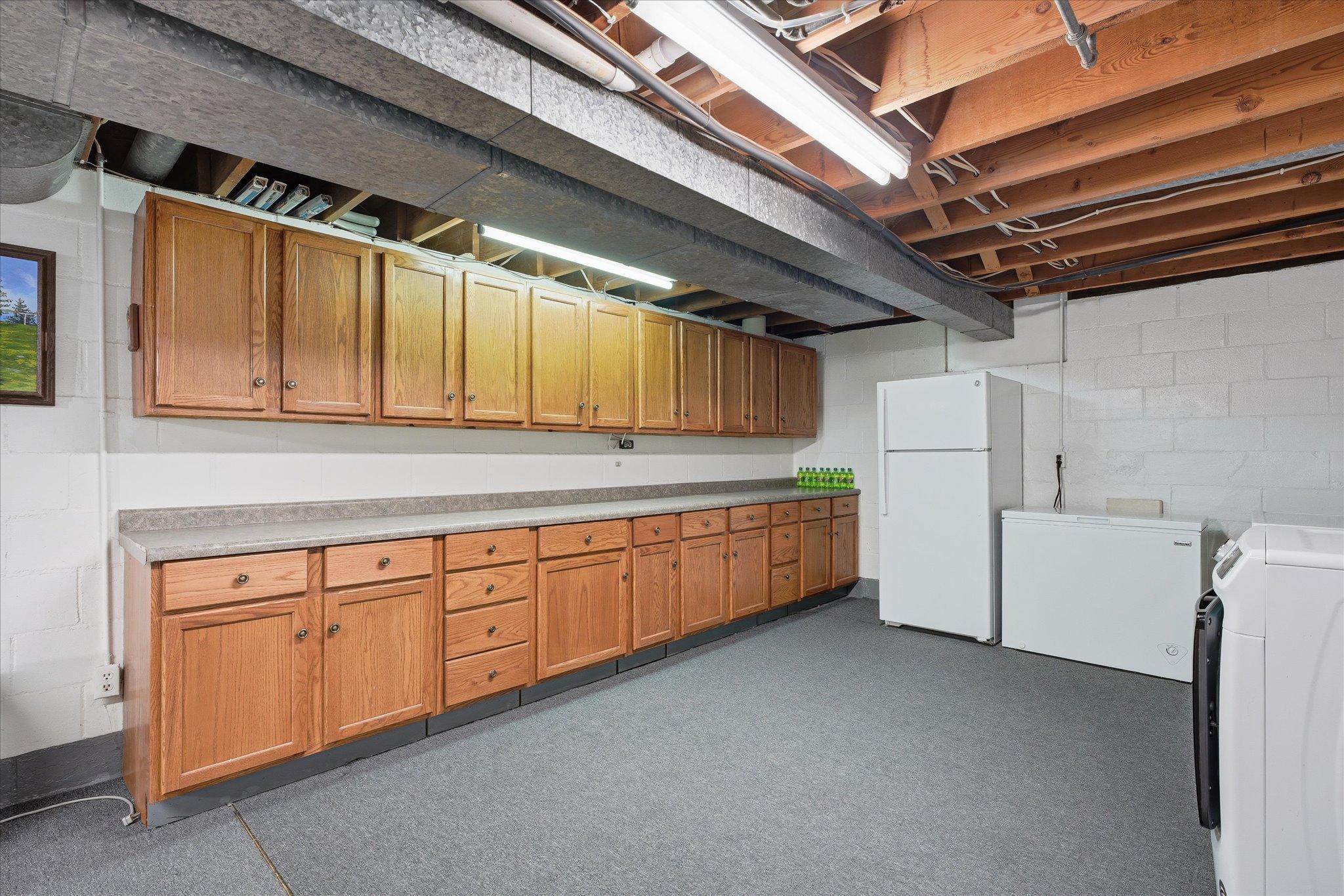 Another view of the awesome cabinet/storage space in the lower level
