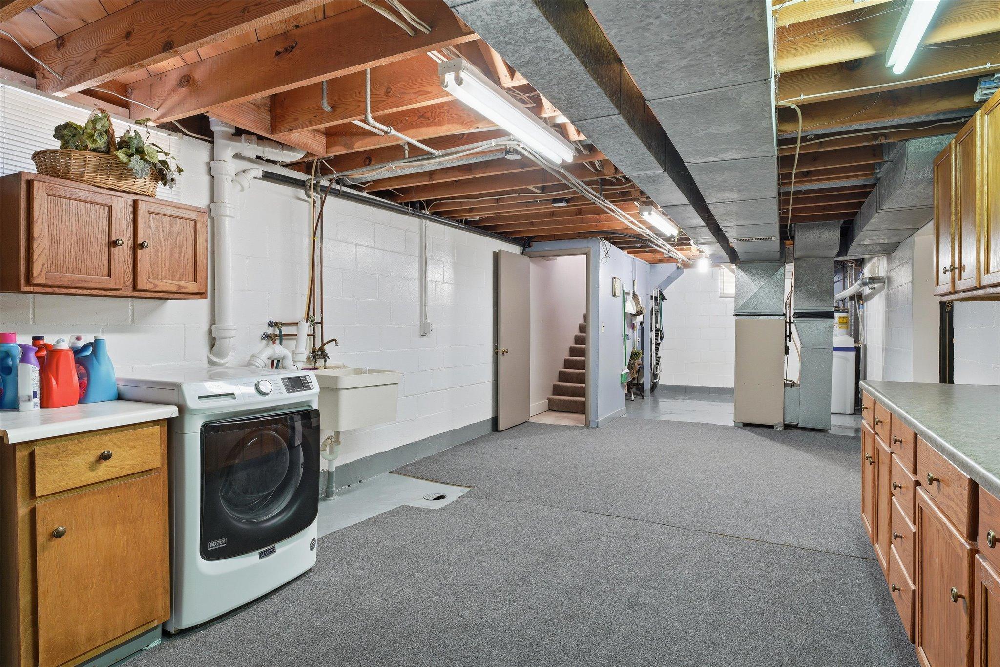 Another view of the basement laundry/mechanical room area