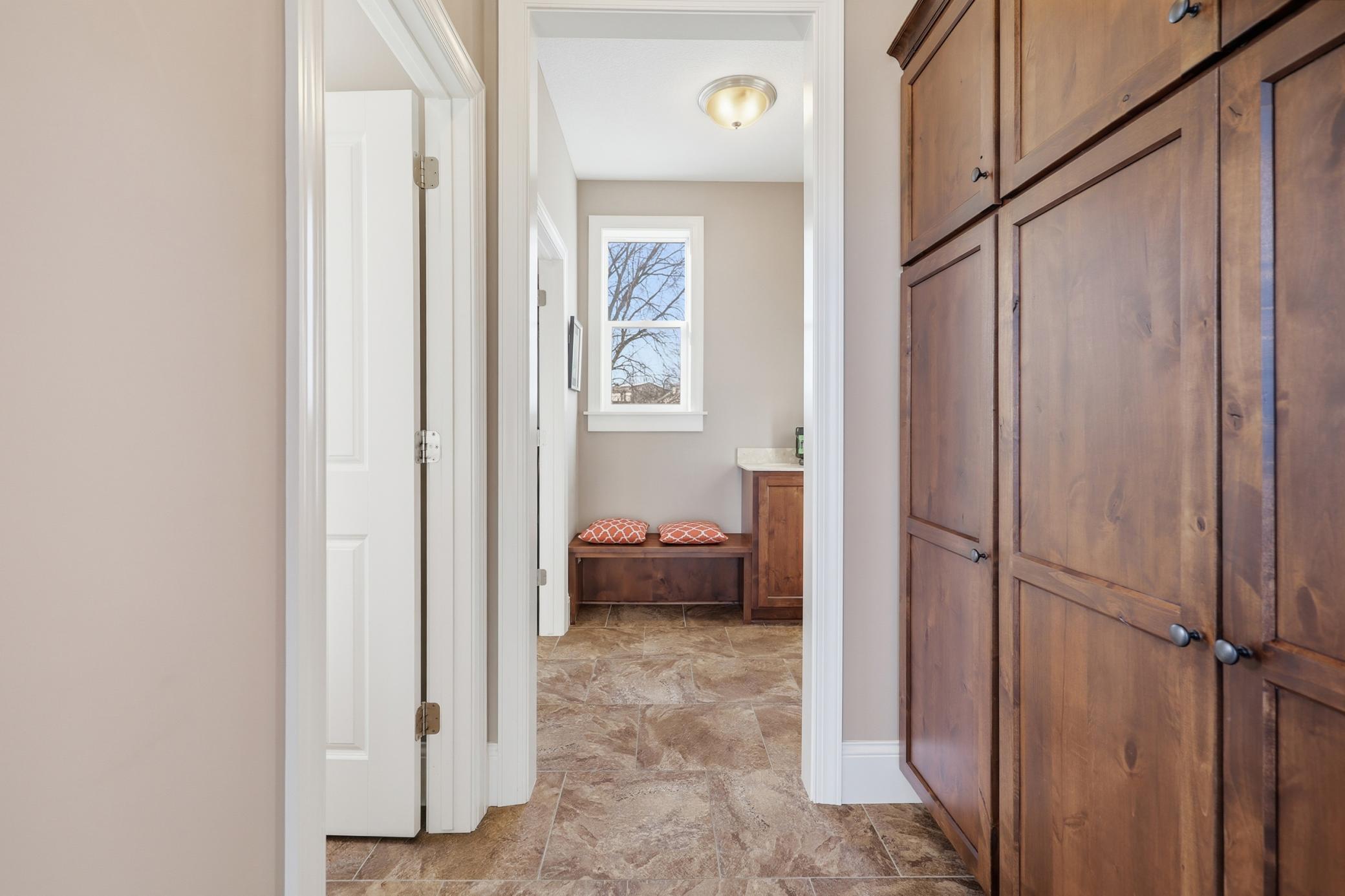 Plenty of storage as you enter from the garage