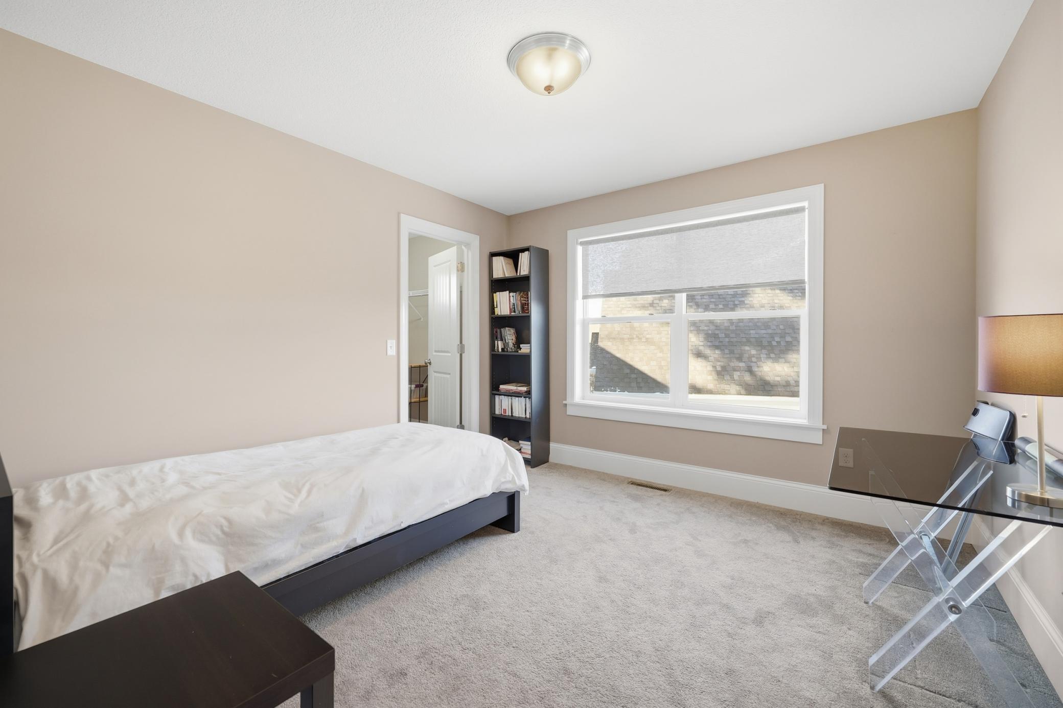 Upper Level Bedroom with walk in closet