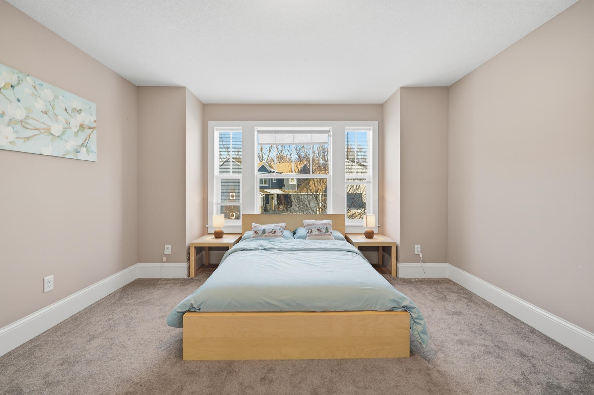 Upper-Level Bedroom with walk in closet