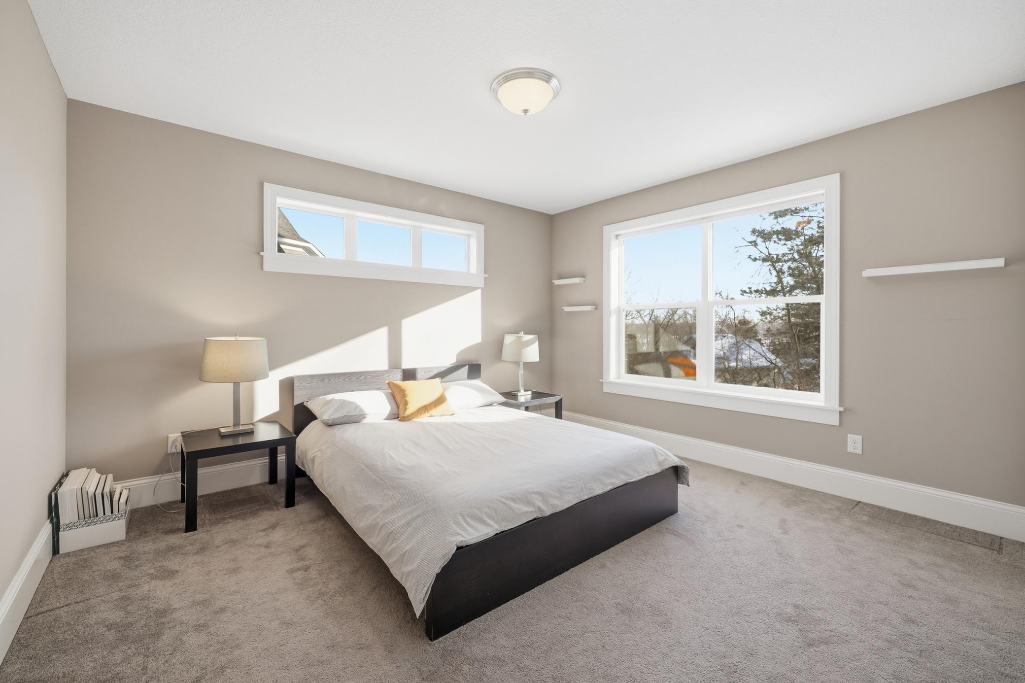 Upper-level Bedroom with walk in closet