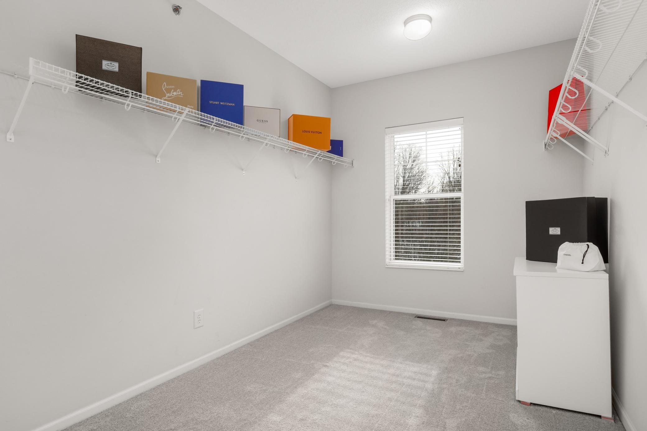 Enormous walk-in closet in the primary suite.