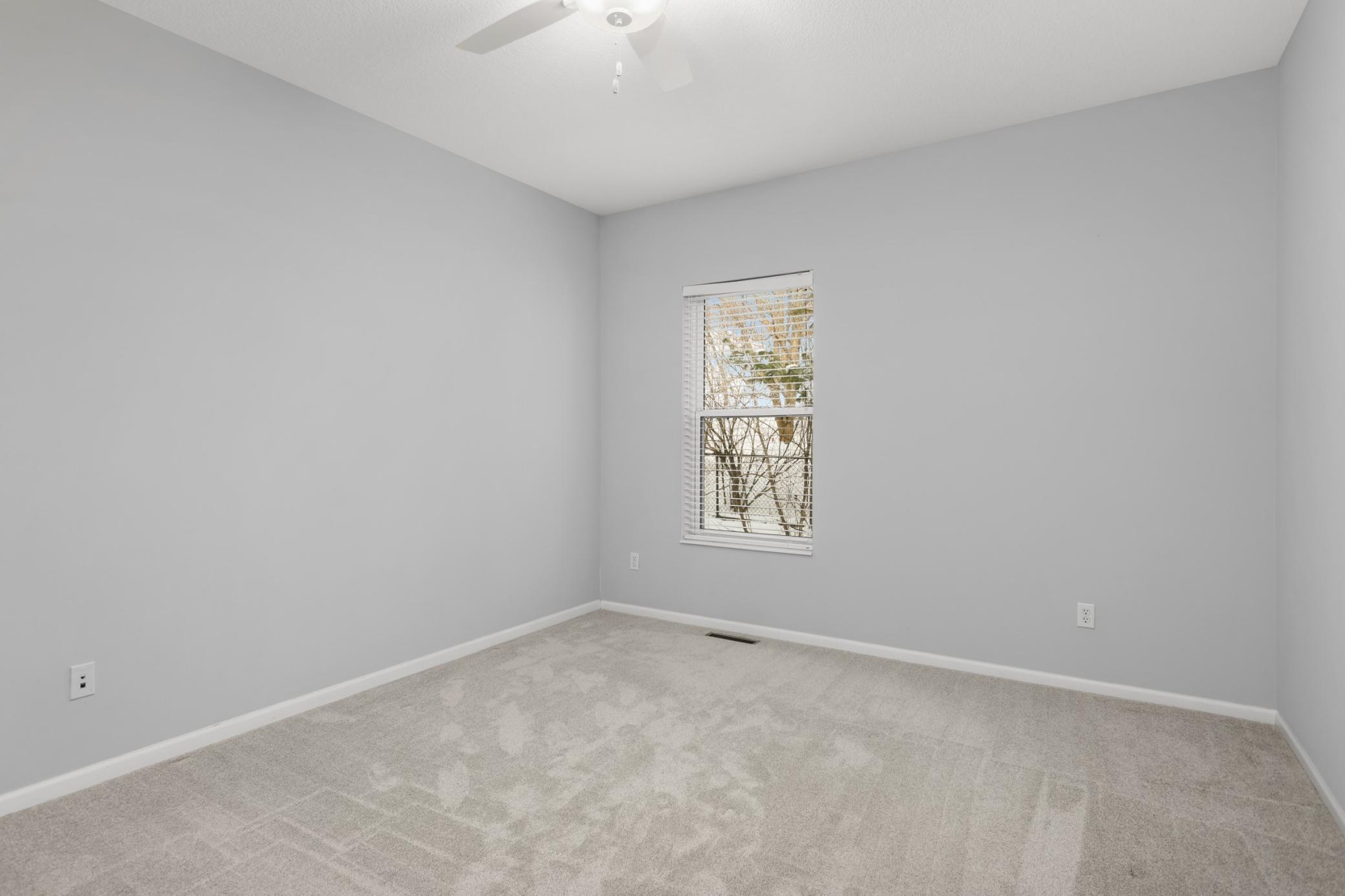 One of two other bedrooms on the upper level.