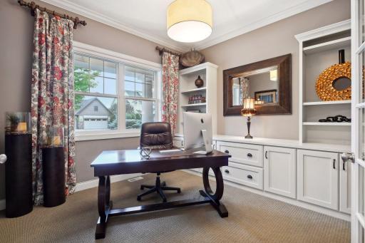 Main floor office complete with custom built ins