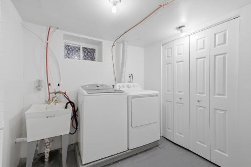 The lower level laundry room is large enough to fit a folding table if desired.