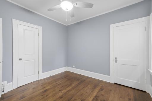 The primary bedroom offers two closets, one of which is a walk-in.