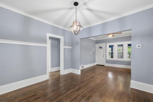 Another view of the dining/living room. The hallway ahead leads to the two main level bedrooms and full bath.