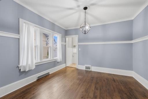 The dining room walls are lined with a decorative ledge to display your favorite things.
