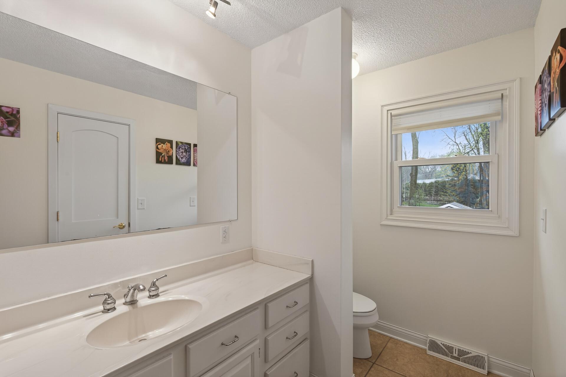 Large main floor 1/2 bath is just off the garage.