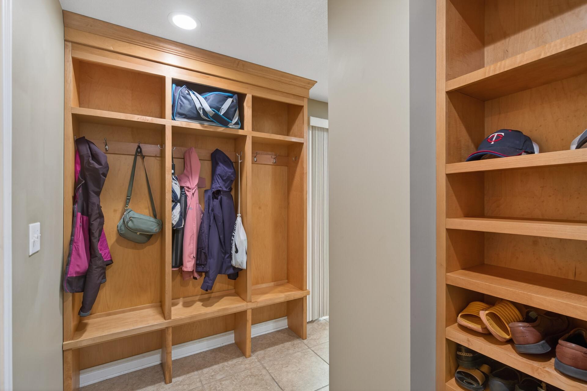 Nice mudroom complete with cubbies & a shoe rack.