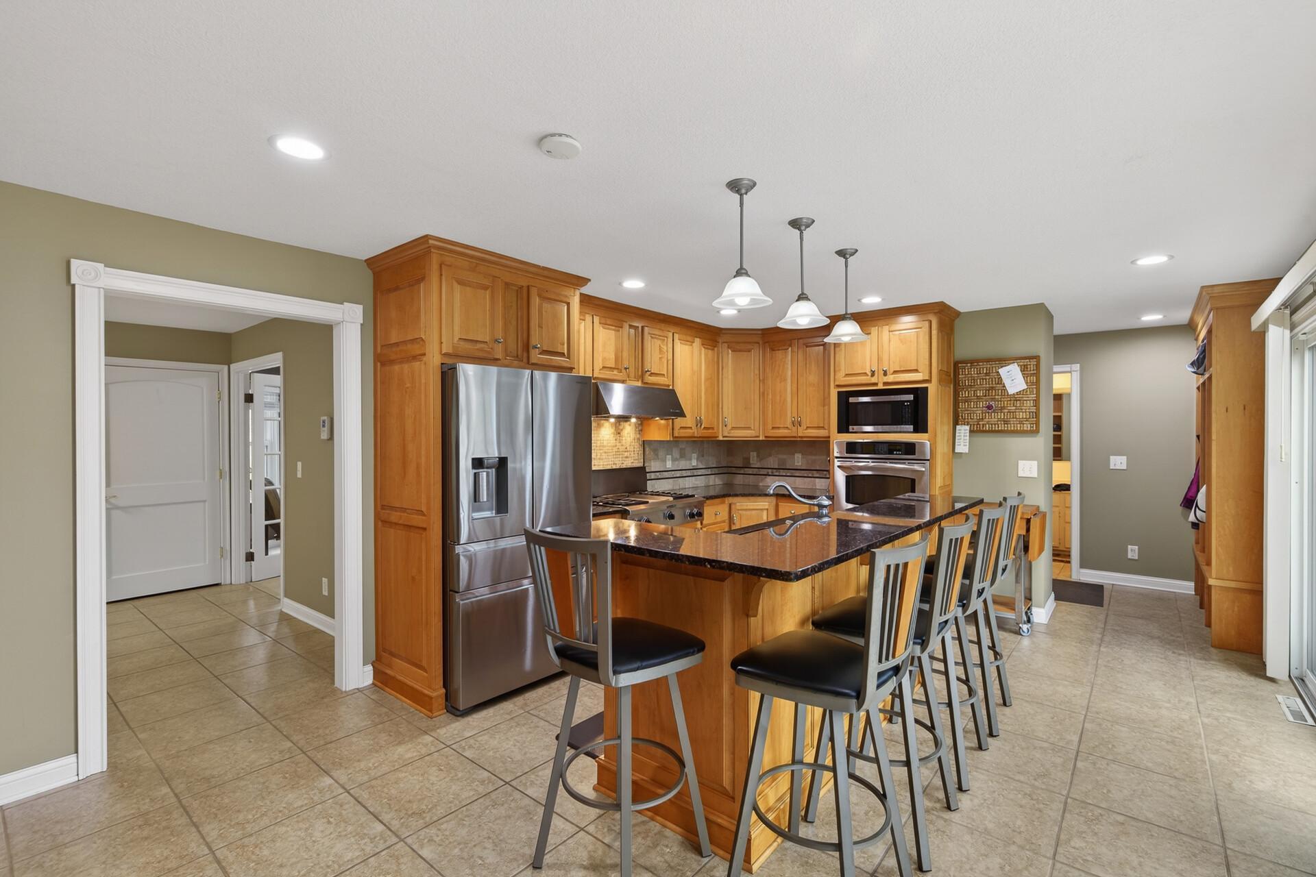 Wonderful kitchen with ample cabinets and countertop space.