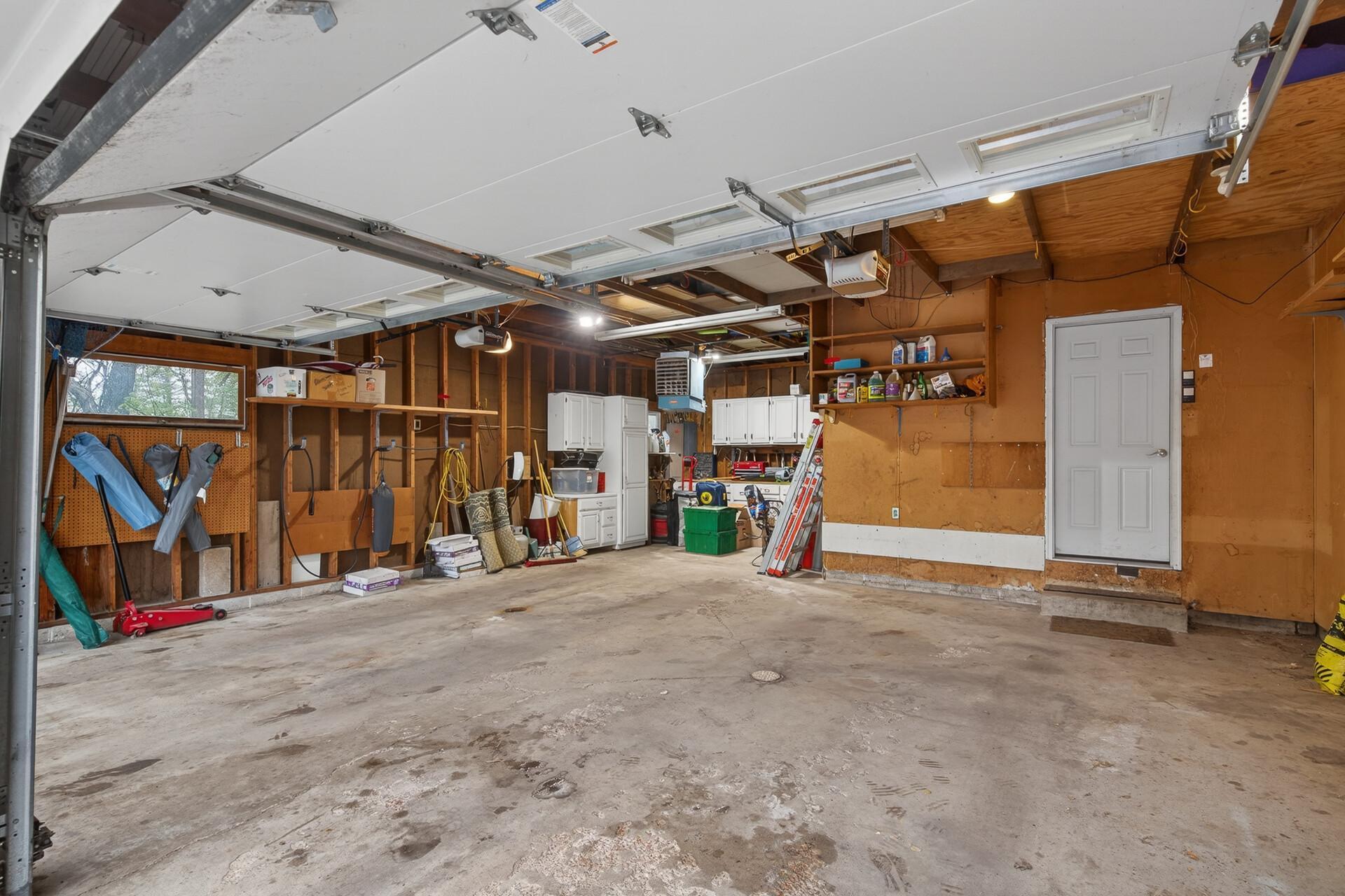 The extra deep garage (29') is perfect for your vehicles + room for a workshop, toys or to store the boat. Don't miss the Tesla Charger.